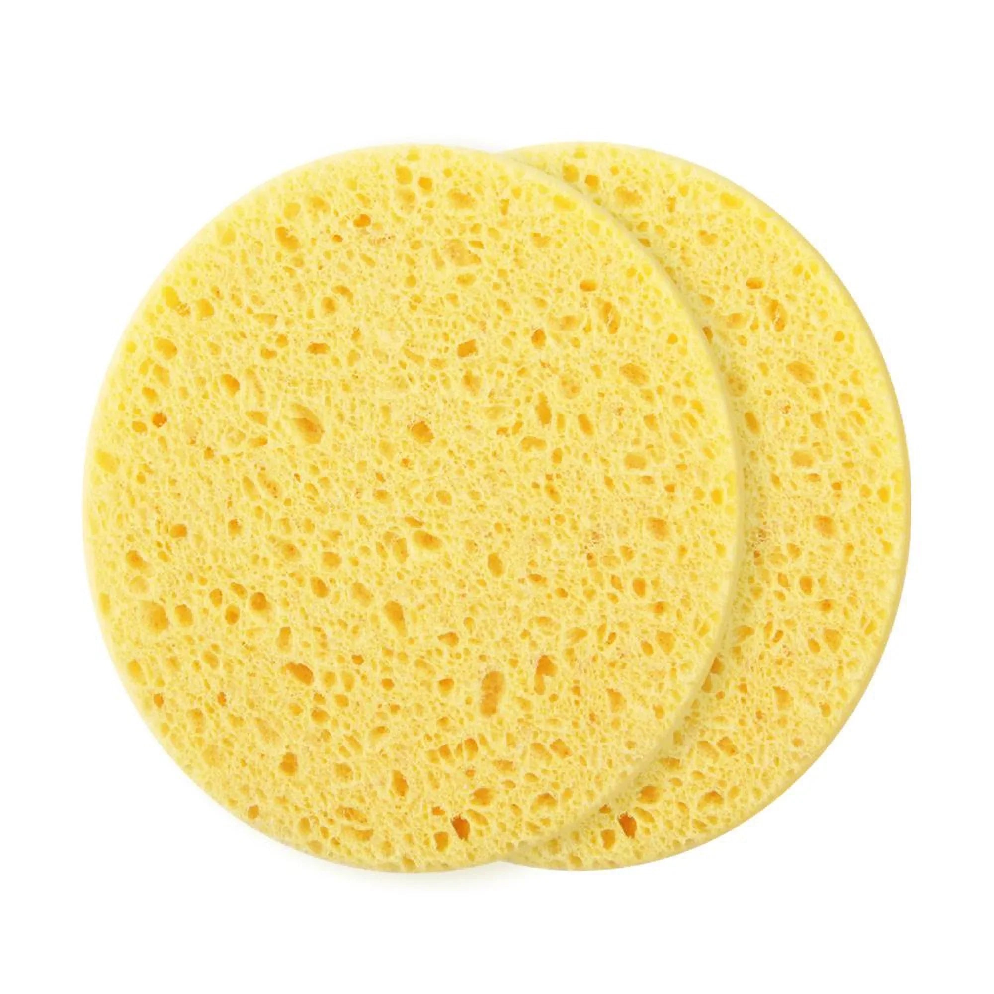 Two yellow sponges on a white background