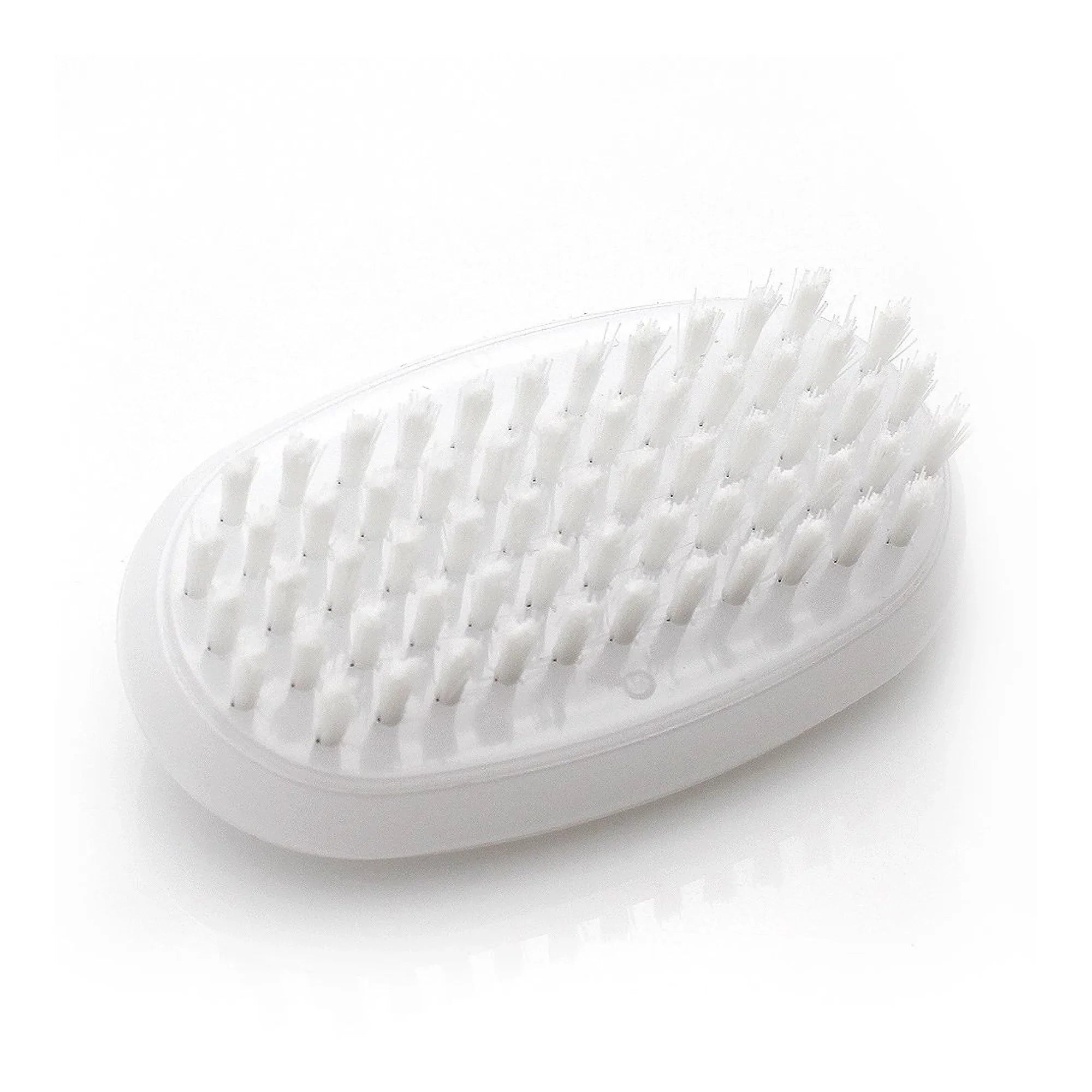 White nail brush on a white background