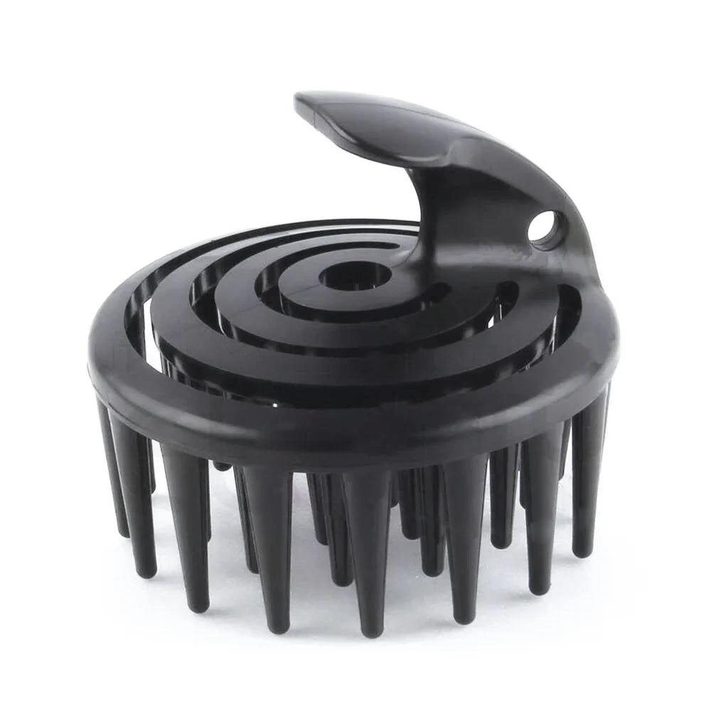 Black plastic scrubber with a handle on a white background